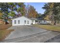 White house exterior with driveway and landscaping at 2108 Ridge Church Rd # A & B, Summerville, SC 29486