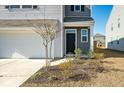 Two-story house, front door entry with gray siding and landscaping at 307 Black Birch Dr, Summerville, SC 29486