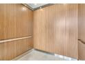 Modern elevator with wood panel interior at 320 Longshore Street St # 1044, Charleston, SC 29492