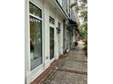 Storefronts along a clean sidewalk with brick accents and landscaping at 712 S Shelmore Blvd # 15, Mount Pleasant, SC 29464