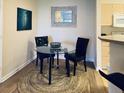 Charming dining area with glass table and comfortable seating at 1300 Park West Blvd # 110, Mount Pleasant, SC 29466
