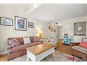 Living room with a cozy sofa, coffee table, and hardwood floors at 149 High Hammock Villas, Seabrook Island, SC 29455