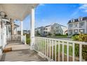 Front porch view of charming neighborhood at 212 Magnolia Garden Dr, Summerville, SC 29483
