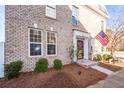 Attractive brick front with American flag and entryway at 826 Rue Dr, Charleston, SC 29414