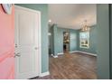 Bright entryway with view of dining area and kitchen at 9761 Transplanter Cir, Ladson, SC 29456