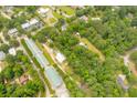 Aerial view showing a property with buildings and storage units at 1225 Central Ave, Summerville, SC 29483
