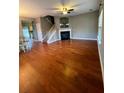 Living room with hardwood floors, fireplace, and plenty of natural light at 406 Chinquapin Dr, Summerville, SC 29485