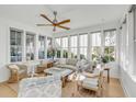 Bright sunroom with ample seating and natural light at 70 Warren St, Charleston, SC 29403