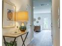 Hallway with a view into a living area, showing an open floor plan at 135 River Hill Rd, Goose Creek, SC 29445