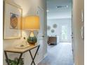 Hallway with a view into living room and access to other rooms at 147 River Hill Rd, Goose Creek, SC 29445