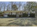 Brick ranch house with a large front yard at 303 Holly Avenue Ave, Goose Creek, SC 29445