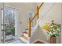 Front entry and staircase with hardwood floors at 1014 Ariel Ct, Summerville, SC 29485