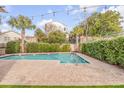 Clean lines and a spacious feel define this inviting pool and patio area at 109 Carolina Blvd, Isle of Palms, SC 29451