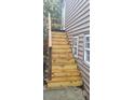 Wooden stairs leading to back entrance at 1150 King St, Charleston, SC 29403