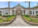 Attractive community entrance with landscaping and a gated walkway at 1300 Park West Blvd # 1109, Mount Pleasant, SC 29466