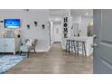 Bright and airy entryway with view of living room and kitchen at 1300 Park West Blvd # 417, Mount Pleasant, SC 29466