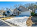 Two-story home with attached garage and neatly landscaped front yard at 2426 Tuscany Dr, North Charleston, SC 29406