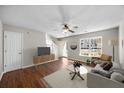 Bright living room with hardwood floors and natural light at 247 Trickle Dr, Summerville, SC 29483