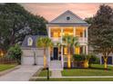 Two-story home with charming front porch at 3168 Treadwell St, Mount Pleasant, SC 29466