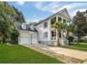Two-story home with two-car garage and driveway at 3168 Treadwell St, Mount Pleasant, SC 29466