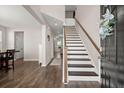 Bright and airy entryway with hardwood floors and staircase at 103 Oyama Rd, Summerville, SC 29486
