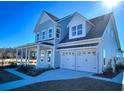 Two-story house with double garage and front porch at 1573 Trailmore Ln, Summerville, SC 29486