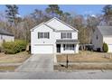 Two-story house with white siding, black shutters, and a two-car garage at 230 Eagle Ridge Rd, Summerville, SC 29485
