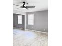 Spacious living room with gray walls and wood-look floors at 348 Cleveland St, Walterboro, SC 29488