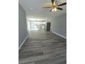 Spacious living room with gray walls, wood-look floors, and an open layout at 161 Stratton Dr, North Charleston, SC 29420