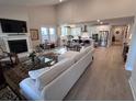 Open concept living space with hardwood floors and fireplace at 178 Wappoo Trace Ln, Summerville, SC 29486