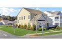 Two-story house with a large yard and mature trees in a residential area at 203 Oak View Way, Summerville, SC 29483
