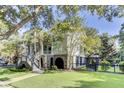 Two-story house with a large front porch, side yard, and walkway at 400 Bay Crossing Rd, Mount Pleasant, SC 29464
