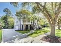 Two-story house with a large driveway and nicely landscaped yard at 400 Bay Crossing Rd, Mount Pleasant, SC 29464