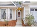 Welcoming front entrance with a glass door and sidelights at 4845 Carnoustie Ct, Summerville, SC 29485