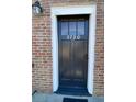 Stylish black front door with glass panels and white trim at 5730 Hoover Ave, Hanahan, SC 29410
