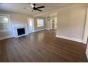Spacious living room featuring hardwood floors and a fireplace at 5730 Hoover Ave, Hanahan, SC 29410