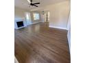 Hardwood floors and fireplace in a bright living room at 5730 Hoover Ave, Hanahan, SC 29410