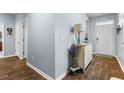 Bright entryway with light gray walls and wood flooring at 115 Holly Leaf Ln, Summerville, SC 29486