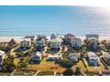 Aerial view of beach homes and neighborhood at 1681 E Ashley Ave # A & B, Folly Beach, SC 29439