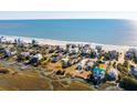 Aerial view of beach homes and waterway at 1681 E Ashley Ave # A & B, Folly Beach, SC 29439