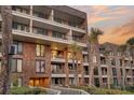 Modern coastal building with wood siding and balconies at 2371 Shipwatch Rd, Kiawah Island, SC 29455