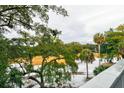 View of a snow covered golf course from a balcony at 251 Driftwood Ln # 251, Edisto Island, SC 29438