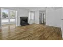 Living room with hardwood floors, fireplace, and ample natural light at 267 Alexandra # 6, Mount Pleasant, SC 29464