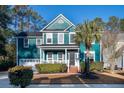 Beautiful teal two-story house with palm trees at 3100 Sonja Way, Mount Pleasant, SC 29466