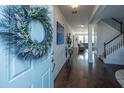 Inviting entryway with hardwood floors and view to living room at 3157 Timberline Dr, Johns Island, SC 29455