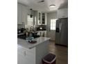 Bright kitchen featuring white cabinets and stainless steel appliances at 4329 Spur St, North Charleston, SC 29405