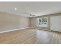 Spacious living room with light walls and wood-look floors at 517 Travelers Blvd, Summerville, SC 29485