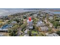 Aerial view showcasing home's location near the water at 209 Charleston Blvd, Isle of Palms, SC 29451