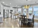 Modern kitchen with stainless steel appliances and an island at 3002 Cross Vine Ln, Summerville, SC 29483