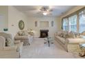 Spacious living room with fireplace and comfortable seating at 3312 Middlesboro Ave, Summerville, SC 29485